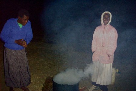 Hot tea cooking on an open fire.